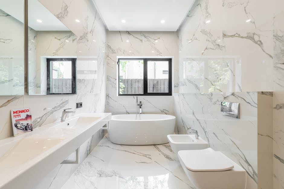 pexels photo 7587862 7587862 Elegant bathroom with marble tiles, bathtub, and modern fixtures for a luxury feel.